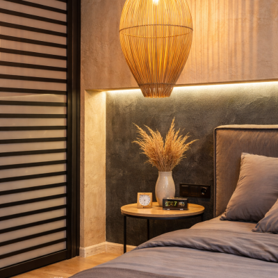 cozy modern bedroom corner with pendant light